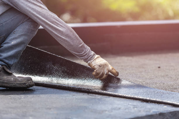 Professional Emergency Waterproofing technician working in Greensboro, NC